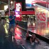 Photos, Video: Times Square Slip 'N Slide, Hockey, And Rugby During Irene Rain